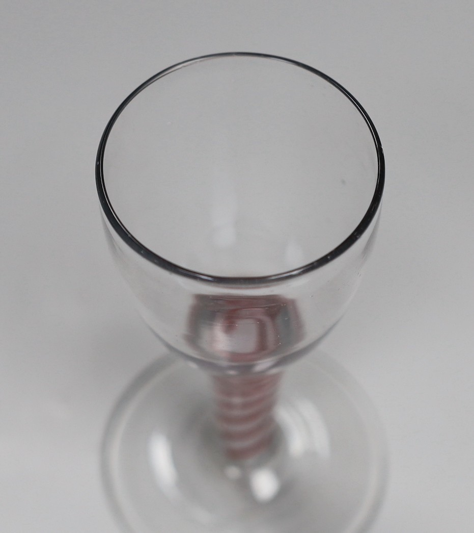 An 18th century Dutch colour twist stem wine glass. 13cm high